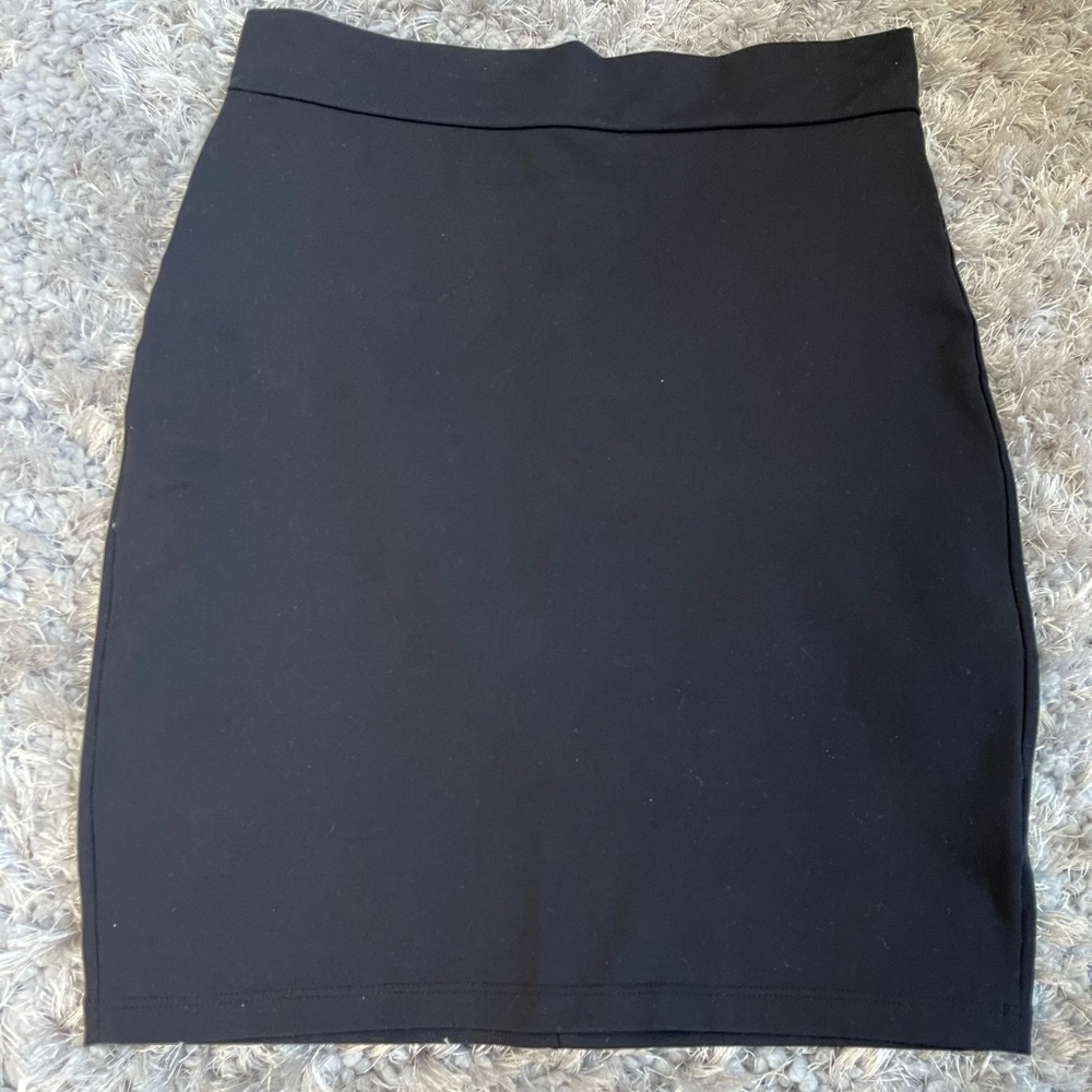 Black Bebe mini skirt